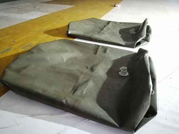 油囊式浮力调节装置（油囊的浮力调节系统设计）